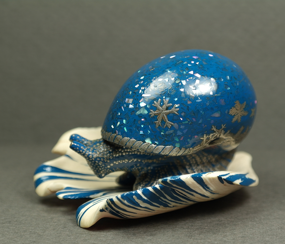 Winter snail on a petal 04